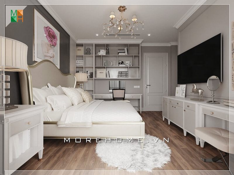 Mẫu thiết kế nội thất phòng ngủ chung cư tân cổ điển là sự chắt lọc tinh túy từ cổ điển, cộng thêm nét phóng khoáng của con người hiện đại. Điều đó thể qua sự sáng tạo thiết kế chiếc giường với họa tiết uốn lượn điêu luyện phía đầu giường kết hợp với kệ tivi và kệ giá sách hiện đại tạo nên một không gian phòng ngủ đẹp mặt, vì thế thiết kế nội thất phòng ngủ tân cổ điển luôn đem đến những giá trị tuyệt vời và hoàn hảo.