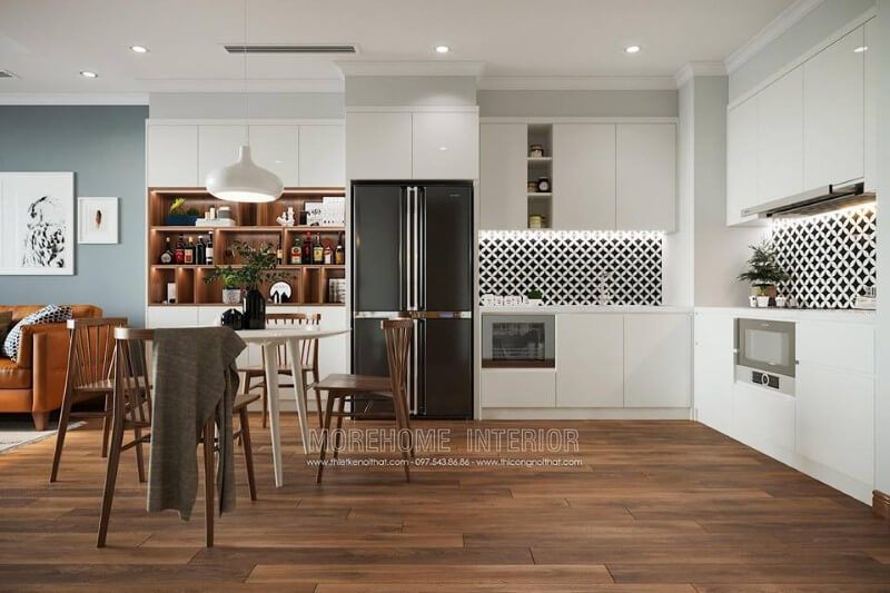 Khu vực bếp được thiết kế nhỏ gọn và kết nối trực tiếp với phòng khách.